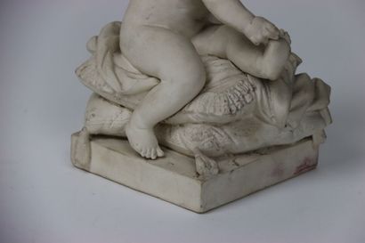 MOUGIN, Enfant assis sur un coussin à fleurs...