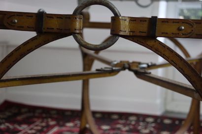 Wrought iron table decorated with yellow...