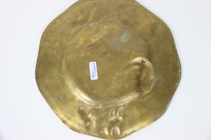 Gilt bronze dish decorated in relief with...
