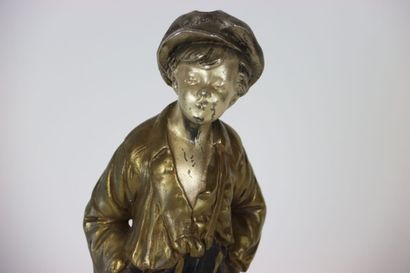 Sculpture in metal figuring gavroche and...