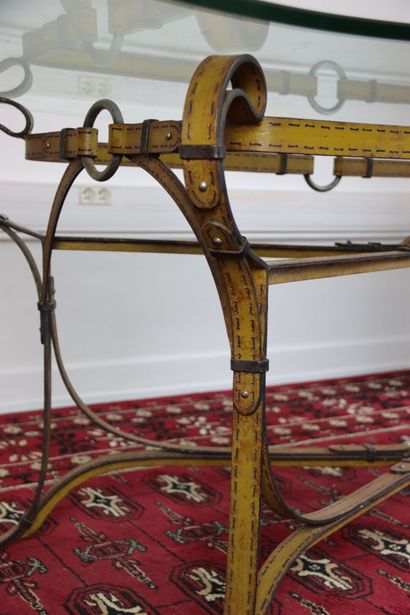 Wrought iron table decorated with yellow...