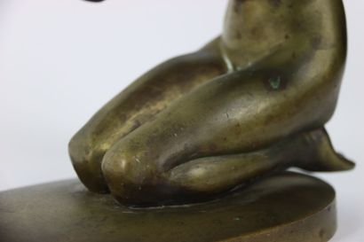 Gilded and chiseled bronze representing a...
