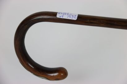 Set of 4 canes, some silver. Beginning of...
