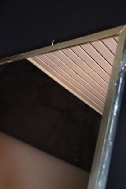 Large mirror supporting a console with beech...