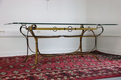 Wrought iron table decorated with yellow...