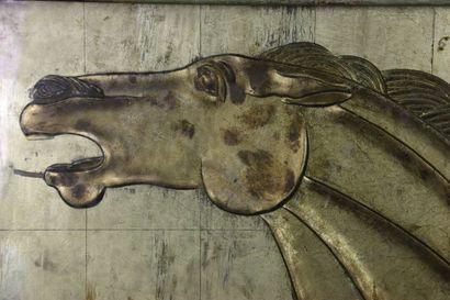 Engraved glass panel, lacquered with gold....