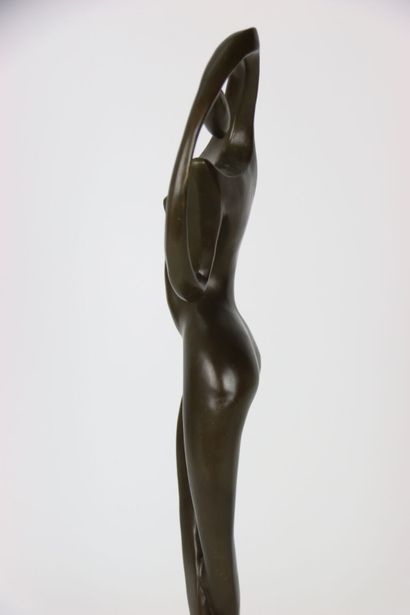 Large statue in bronze, representing a stylized...