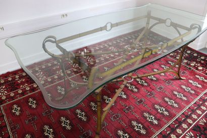 Wrought iron table decorated with yellow...