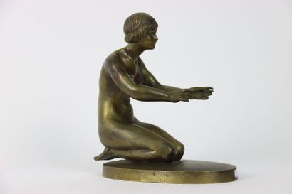 Gilded and chiseled bronze representing a...