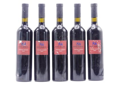 5 bouteilles de MAURY 2003 MAS AMIEL. 





Sur...