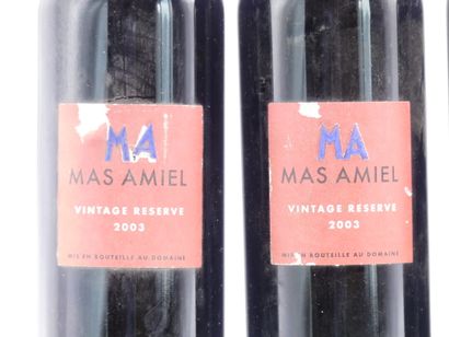 5 bouteilles de MAURY 2003 MAS AMIEL. 





Sur...