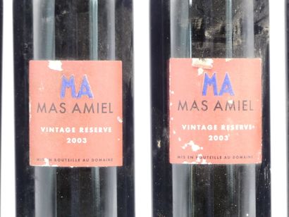 5 bouteilles de MAURY 2003 MAS AMIEL. 





Sur...