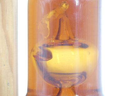 1/2 bouteille de CALVADOS, DU BREUIL. Dans...