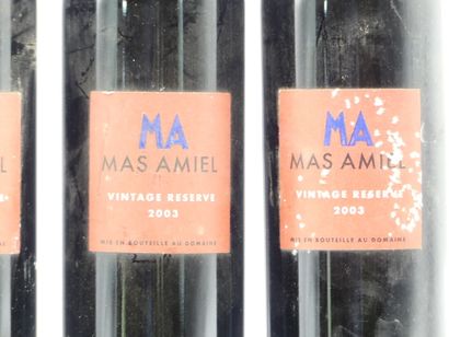 5 bouteilles de MAURY 2003 MAS AMIEL. 





Sur...
