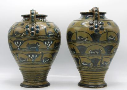 Louis LOURIOUX (1874-1930). Deux vases en...