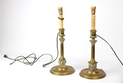 Pair of lamps in gilded brass, the shaft...
