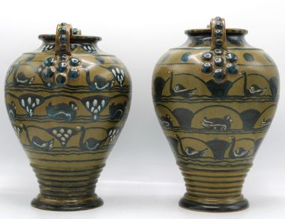 Louis LOURIOUX (1874-1930). Deux vases en...