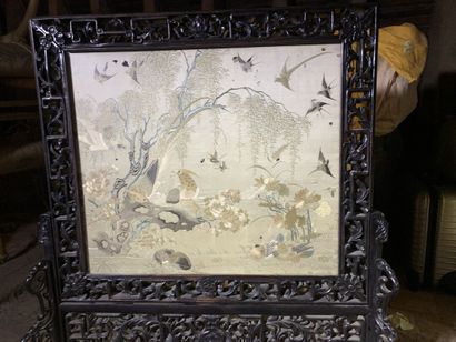 Black lacquered wood mantelpiece with an...