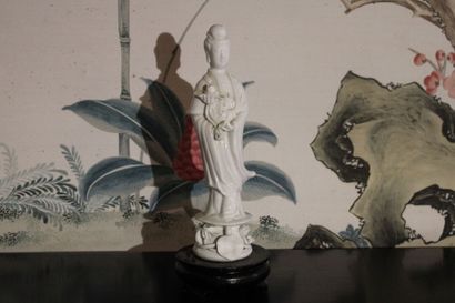 China 20th century, Porcelain figure, holding...