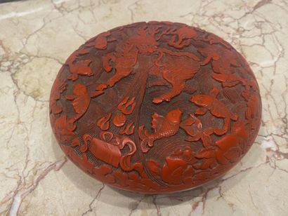 CHINA. Red lacquer box with dragons decoration....