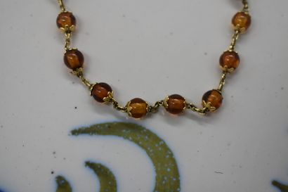 Gold bracelet and Amber beads. Length: 19,5...