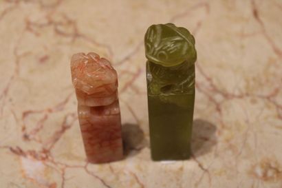 ASIA. Two jade stamps topped by a dragon....