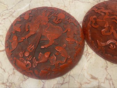 CHINA. Red lacquer box with dragons decoration....