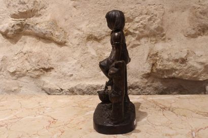 Young child and his basket, Bronze, signed...