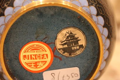 JAPAN. XXth. Brass pot decorated with a connected...