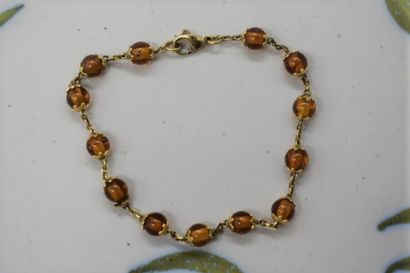 Gold bracelet and Amber beads. Length: 19,5...