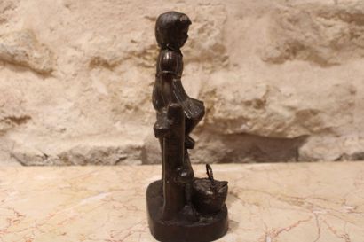 Young child and his basket, Bronze, signed...
