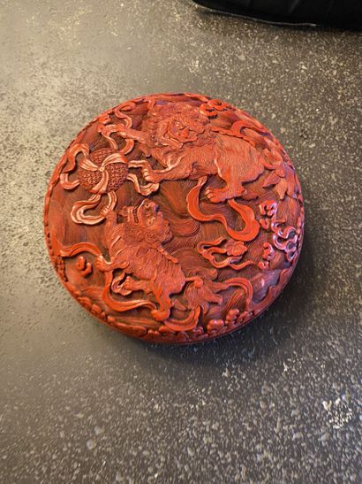 CHINA. Red lacquer box with dragons decoration....