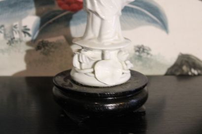 China 20th century, Porcelain figure, holding...