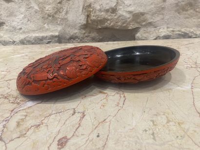 CHINA. Red lacquer box with dragons decoration....