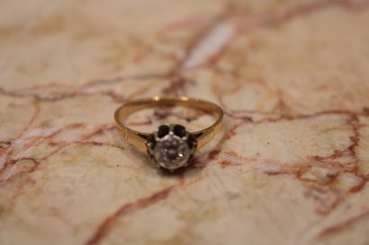 Yellow gold solitaire ring, set with a brilliant-cut...