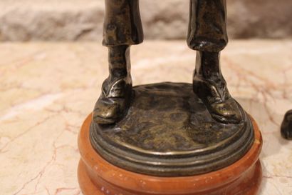 The whistler and his dog, patinated bronze...