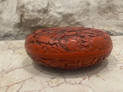 CHINA. Red lacquer box with dragons decoration....
