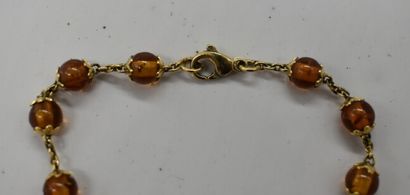 Gold bracelet and Amber beads. Length: 19,5...