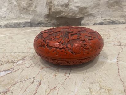 CHINA. Red lacquer box with dragons decoration....