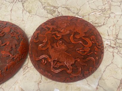 CHINA. Red lacquer box with dragons decoration....