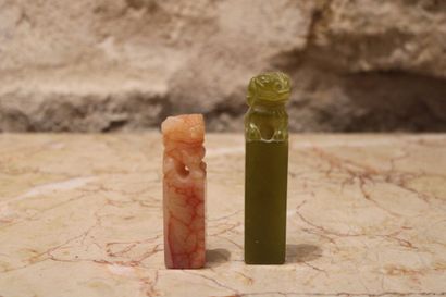 ASIA. Two jade stamps topped by a dragon....