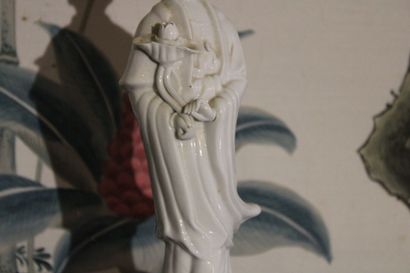 China 20th century, Porcelain figure, holding...