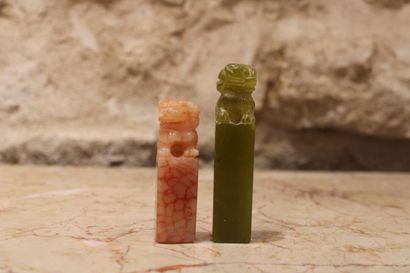 ASIA. Two jade stamps topped by a dragon....