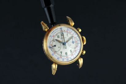 HELVETIA
Chronographe en or jaune 18k. Boitier...