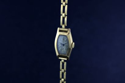ROC
Montre de dame en or jaune 18k.

Cadran...