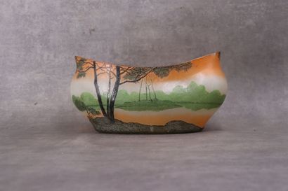 LEGRAS. Planter with oval body and curved...