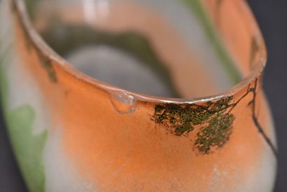 LEGRAS. Planter with oval body and curved...