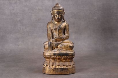 INDE. Divinité en bois sculpté et doré. Hauteur...