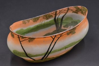 LEGRAS. Planter with oval body and curved...
