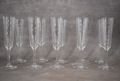 BACCARAT. Set of ten crystal champagne flutes,...